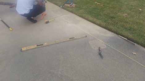 lifting the sidewalk for it to drain properly