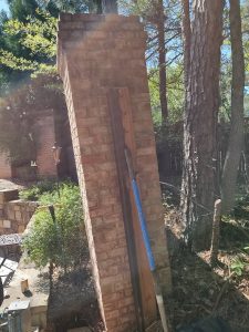 Before Straightening Leaning Brick Column