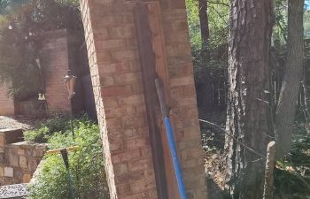 Before Straightening Leaning Brick Column