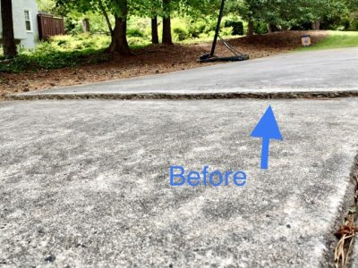 Before: This client’s driveway had a slab that sank several inches below the adjacent slab.
